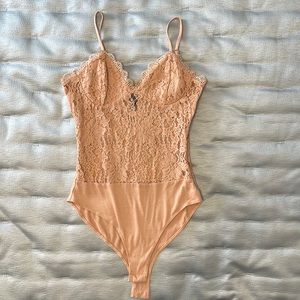 Peachy pink laced bodysuit